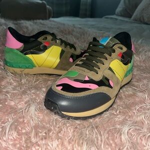 Valentino Garavanni camo studded sneakers.